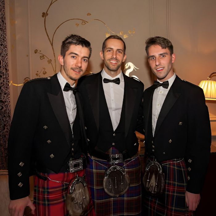 Image: Owen with colleagues Max and Matt at a Scottish banquet dinner in Strathisla, Scotland